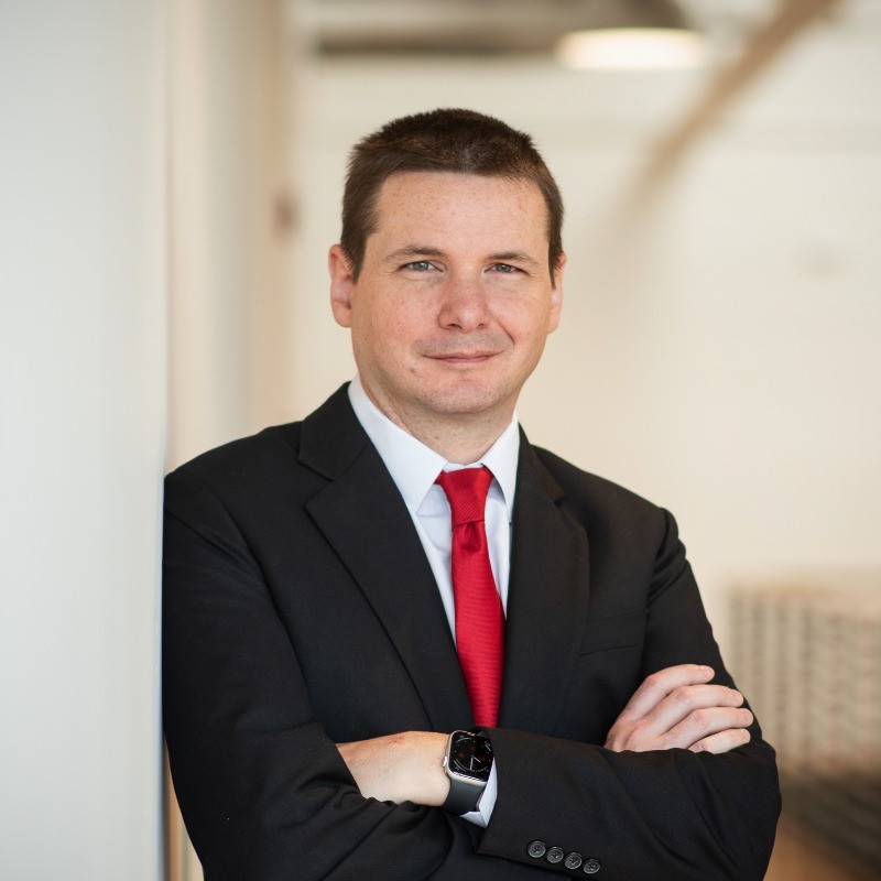 Adam Hinds in professional attire